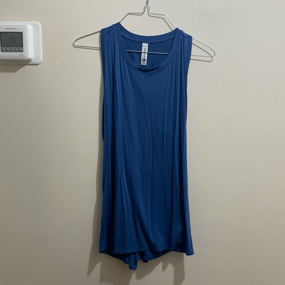 Sanutch sleeveless open back casual workout top.  Size large but fits smaller